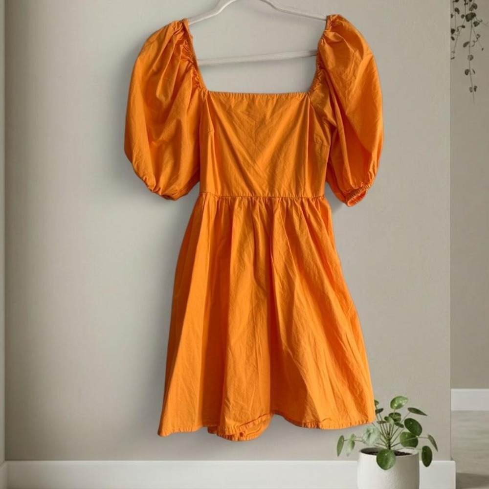 Orange puff sleeve dress with open back detail Size S